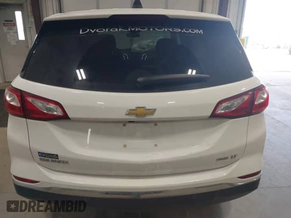 2018 Chevrolet Equinox LT with VIN 2GNAXSEV1J6238889, listed as a IAAI auction lot 43272942 with 98,674 mi miles and . Bid and sale history available at DreamBid. Image 16.