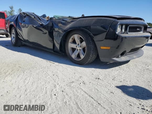 ✅ 2013 Dodge Challenger SXT • VIN: 2C3CDYAGXDH662976 • Lot: 75132514. Wystawiony na Copart z przebiegiem Nie podano. Bezpłatny archiwum sprzedaży aukcyjnych z USA i szczegółowy raport historii pojazdu na DreamBid. Zdjęcie 4.