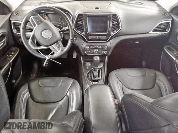 ✅ 2019 Jeep Cherokee Overland • VIN: 1C4PJMJN8KD255889 • Lot: 92038095. Listed on Copart with 128,092 mi. Free auction sales archive from the USA and detailed vehicle history report at DreamBid. Image 8.