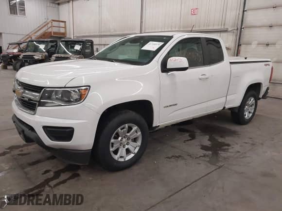 2020 Chevrolet Colorado 4WD LT z VIN 1GCHTCEA3L1160482, wystawiony jako IAAI lot #41720575 z przebiegiem 96 062 mil mil oraz . Historia ofert i sprzedaży dostępna na DreamBid. Obrazek 2.