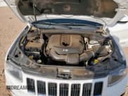 ✅ 2015 Jeep Grand Cherokee Laredo • VIN: 1C4RJEAG4FC109095 • Lot: 70170205. Listed on Copart with 83,614 mi. Free auction sales archive from the USA and detailed vehicle history report at DreamBid. Image 12.