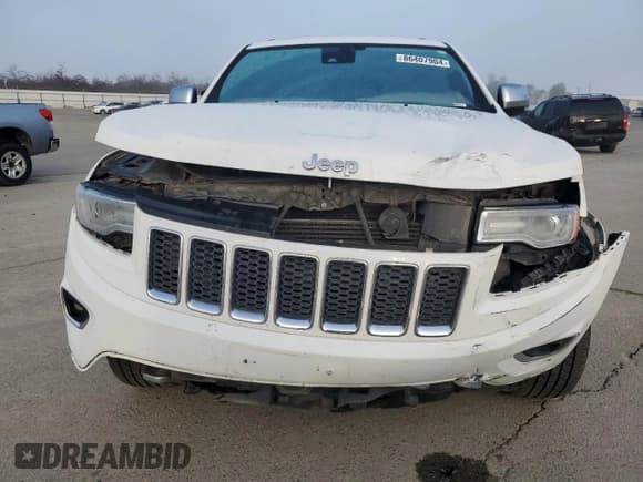 ✅ 2016 Jeep Grand Cherokee Overland • VIN: 1C4RJFCM9GC332730 • Lot: 86407904. Listed on Copart with 158,693 mi. Free auction sales archive from the USA and detailed vehicle history report at DreamBid. Image 5.