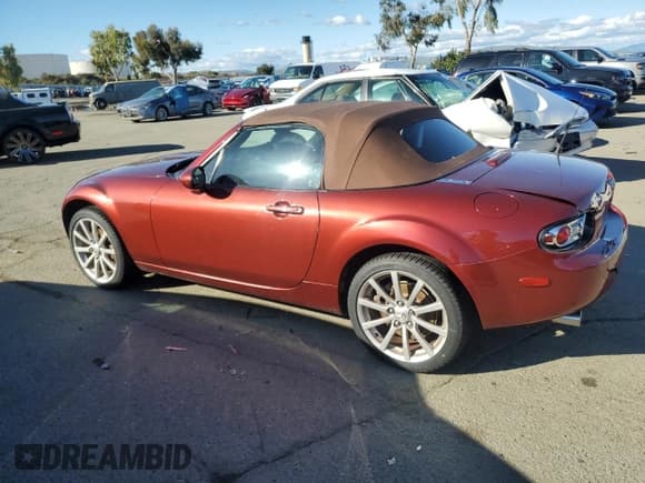 ✅ 2006 Mazda MX-5 Miata Touring • VIN: JM1NC25F260119246 • Lot: 41832175. Wystawiony na Copart z przebiegiem 102 710 mil. Bezpłatny archiwum sprzedaży aukcyjnych z USA i szczegółowy raport historii pojazdu na DreamBid. Zdjęcie 2.