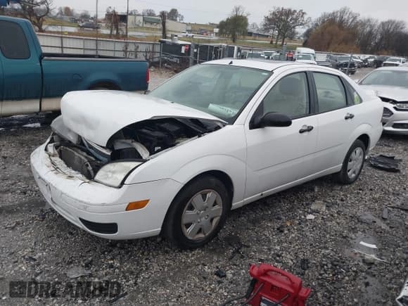 ✅ 2007 Ford Focus S • VIN: 1FAHP34N57W355068 • Lot: 43735746. Listed on IAAI with 126,471 mi. Free auction sales archive from the USA and detailed vehicle history report at DreamBid. Image 2.
