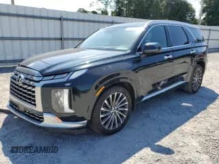 2023 Hyundai Palisade Calligraphy с VIN KM8R74GEXPU541339, выставлен на аукционе Copart как лот 80321405 с пробегом 70 219 миль миль и Списание • Salvage title. История ставок и продаж доступна на DreamBid. Изображение 1.