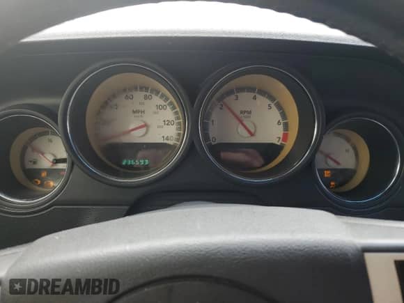 2010 Dodge Challenger SE z VIN 2B3CJ4DV9AH139565, wystawiony jako Copart lot #70805344 z przebiegiem 236 593 mil mil oraz Szkoda całkowita • Salvage title. Historia ofert i sprzedaży dostępna na DreamBid. Obrazek 9.