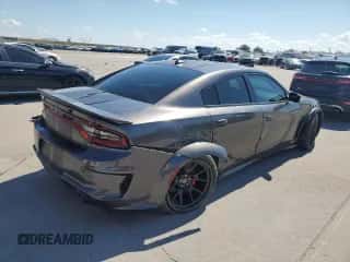 2023 Dodge Charger SRT Hellcat Redeye Widebody z VIN 2C3CDXL94PH503237, wystawiony jako Copart lot #83869155 z przebiegiem 27 372 mil mil oraz Szkoda całkowita • Salvage title. Historia ofert i sprzedaży dostępna na DreamBid. Obrazek 3.