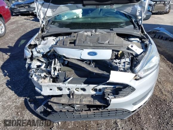 ✅ 2016 Ford Focus S • VIN: 1FADP3E29GL389986 • Lot: 43748330. Wystawiony na IAAI z przebiegiem 76 471 mil. Bezpłatny archiwum sprzedaży aukcyjnych z USA i szczegółowy raport historii pojazdu na DreamBid. Zdjęcie 6.