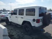 ✅ 2024 Jeep Wrangler Sahara • VIN: 1C4RJXP62RW255492 • Lot: 43407205. Listed on IAAI with 15,649 mi. Free auction sales archive from the USA and detailed vehicle history report at DreamBid. Image 3.