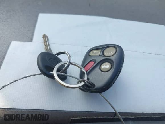 2001 Chevrolet Tahoe LT z VIN 1GNEK13T41J124223, wystawiony jako IAAI lot #42606239 z przebiegiem Nie podano mil oraz . Historia ofert i sprzedaży dostępna na DreamBid. Obrazek 10.