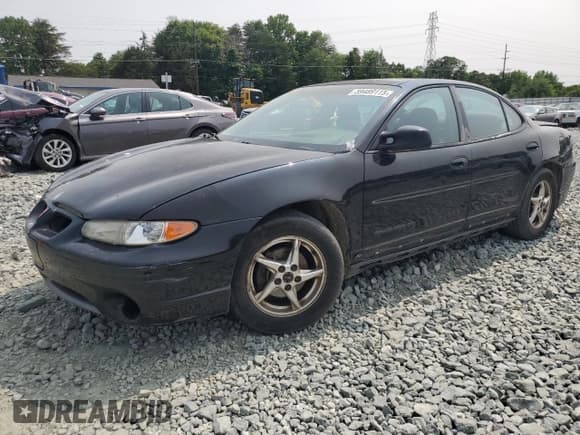 ✅ 2002 Pontiac Grand Prix GT • VIN: 1G2WP52K52F293044 • Lot: 59489115. Listed on Copart with 228,078 mi. Free auction sales archive from the USA and detailed vehicle history report at DreamBid. Image 1.