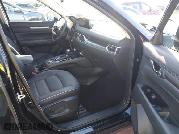 ✅ 2025 Mazda CX-5 S Carbon Edition • VIN: JM3KFBCM7S0690275 • Lot: 43591248. Listed on IAAI with 4,239 mi. Free auction sales archive from the USA and detailed vehicle history report at DreamBid. Image 5.
