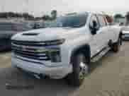 2021 Chevrolet Silverado 3500HD High Country z VIN 1GC4YVEY0MF246295, wystawiony jako Copart lot #70669874 z przebiegiem 134 097 mil mil oraz Szkoda całkowita • Salvage title. Historia ofert i sprzedaży dostępna na DreamBid. Obrazek 1.