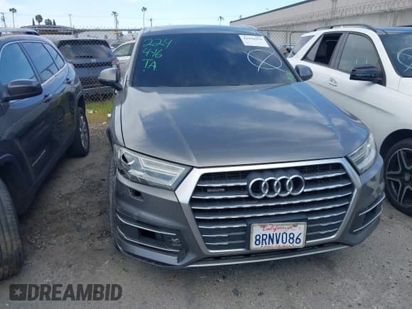 ✅ 2017 Audi Q7 Premium • VIN: WA1AAAF71HD010675 • Lot: 41956959. Listed on IAAI with 136,549 mi. Free auction sales archive from the USA and detailed vehicle history report at DreamBid. Image 13.