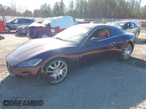 ✅ 2009 Maserati GranTurismo • VIN: ZAMGJ45A490045861 • Lot: 41408433. Listed on IAAI with 91,145 mi. Free auction sales archive from the USA and detailed vehicle history report at DreamBid. Image 2.