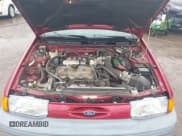 ✅ 1995 Ford Escort • VIN: 1FASP11J5SW107553 • Lot: 42202877. Listed on IAAI with 76,751 mi. Free auction sales archive from the USA and detailed vehicle history report at DreamBid. Image 10.