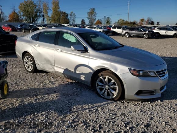 ✅ 2018 Chevrolet Impala LT • VIN: 1G1105SAXJU131477 • Lot: 89521875. Listed on Copart with 130,671 mi. Free auction sales archive from the USA and detailed vehicle history report at DreamBid. Image 4.