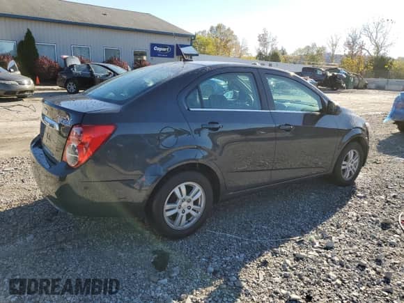 ✅ 2014 Chevrolet Sonic LT • VIN: 1G1JC5SH3E4223783 • Lot: 87204705. Listed on Copart with 69,602 mi. Free auction sales archive from the USA and detailed vehicle history report at DreamBid. Image 3.