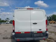 ✅ 2016 Ford Transit Cargo • VIN: 1FTYR1YM0GKA86155 • Lot: 41840237. Listed on IAAI with 192,125 mi. Free auction sales archive from the USA and detailed vehicle history report at DreamBid. Image 17.