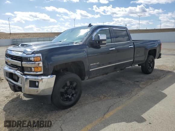 ✅ 2017 Chevrolet Silverado 1500 • VIN: 100000000016199W1 • Лот: 47011105. Опубликован ранее на Copart с пробегом 128 779 миль. Бесплатный доступ к архиву аукционных продаж из США и подробный отчёт об истории автомобиля на DreamBid. Изображение 1.