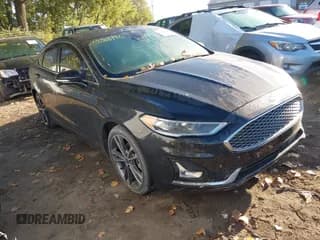 ✅ 2020 Ford Fusion Titanium • VIN: 3FA6P0K91LR198146 • Lot: 43388190. Listed on IAAI with 53,857 mi. Free auction sales archive from the USA and detailed vehicle history report at DreamBid. Image 1.