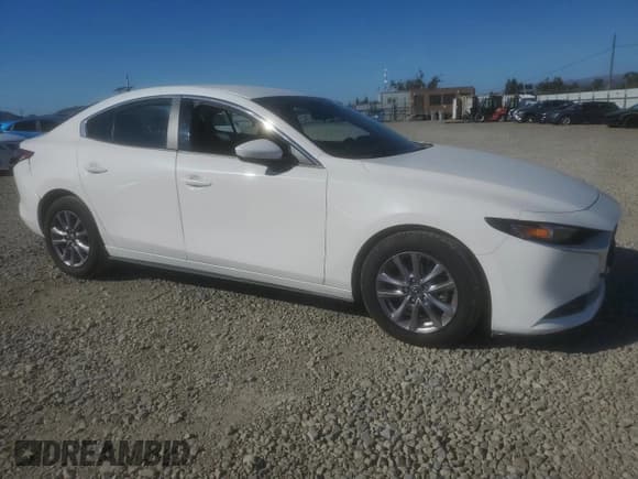 ✅ 2021 Mazda 3 S • VIN: 3MZBPAAL9MM202113 • Lot: 82668315. Listed on Copart with 60,193 mi. Free auction sales archive from the USA and detailed vehicle history report at DreamBid. Image 4.