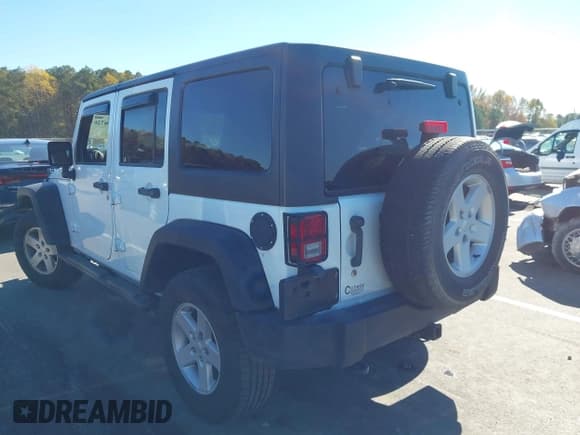 ✅ 2016 Jeep Wrangler Unlimited Sport • VIN: 1C4BJWDG2GL215338 • Lot: 43606726. Listed on IAAI with 103,330 mi. Free auction sales archive from the USA and detailed vehicle history report at DreamBid. Image 3.