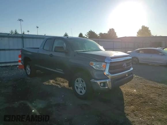 ✅ 2014 Toyota Tundra SR • VIN: 5TFRM5F10EX080908 • Lot: 80336615. Listed on Copart with 132,701 mi. Free auction sales archive from the USA and detailed vehicle history report at DreamBid. Image 13.