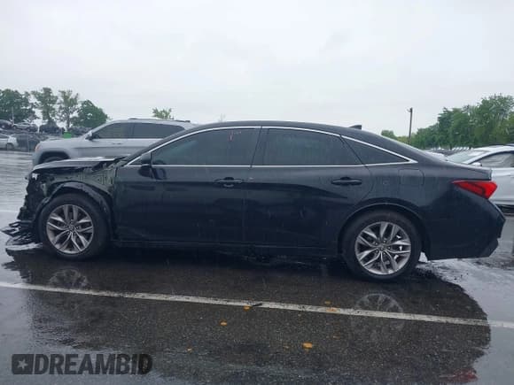 ✅ 2021 Toyota Avalon XLE • VIN: 4T1AZ1FB8MU059364 • Lot: 42368655. Listed on IAAI with 60,702 mi. Free auction sales archive from the USA and detailed vehicle history report at DreamBid. Image 14.
