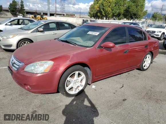 ✅ 2003 Nissan Altima SE • VIN: 1N4BL11E43C325873 • Lot: 82490165. Listed on Copart with 158,806 mi. Free auction sales archive from the USA and detailed vehicle history report at DreamBid. Image 1.