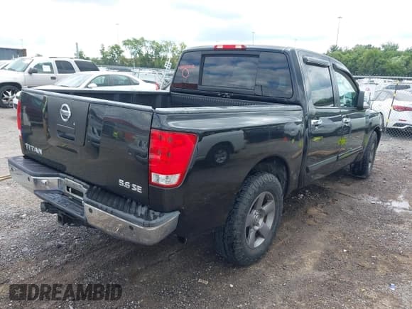 ✅ 2005 Nissan Titan LE • VIN: 1N6BA07A05N528598 • Lot: 43003042. Listed on IAAI with 314,613 mi. Free auction sales archive from the USA and detailed vehicle history report at DreamBid. Image 4.