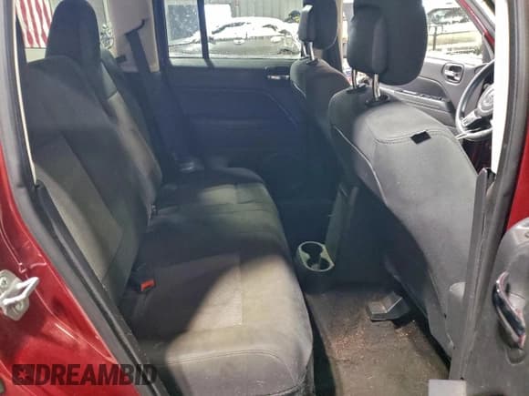 ✅ 2014 Jeep Patriot Sport • VIN: 1C4NJPBA3ED729563 • Lot: 94709845. Listed on Copart with 118,952 mi. Free auction sales archive from the USA and detailed vehicle history report at DreamBid. Image 11.