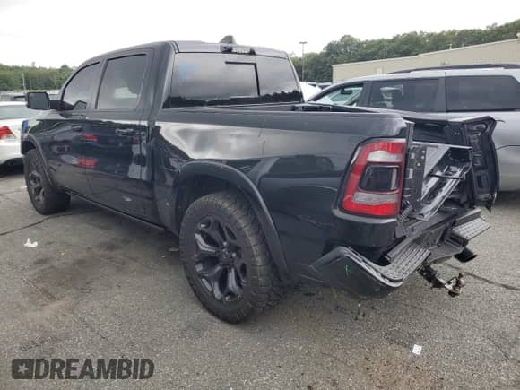 2021 Ram 1500 Limited with VIN 1C6SRFHT7MN746302, listed as a Copart auction lot 68719875 with 66,569 mi miles and Salvage title. Bid and sale history available at DreamBid. Image 2.