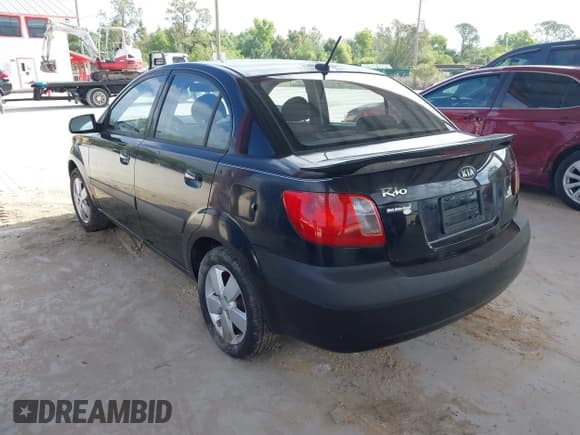 ✅ 2009 Kia Rio LX • VIN: KNADE223496561265 • Лот: 42143889. Опубликован ранее на IAAI с пробегом 235 634 миль. Бесплатный доступ к архиву аукционных продаж из США и подробный отчёт об истории автомобиля на DreamBid. Изображение 3.