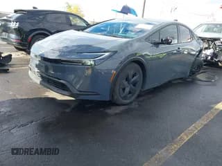 ✅ 2024 Toyota Prius LE • VIN: JTDACAAU5R3018833 • Лот: 43440379. Опубликован ранее на IAAI с пробегом 24 877 миль. Бесплатный доступ к архиву аукционных продаж из США и подробный отчёт об истории автомобиля на DreamBid. Изображение 2.