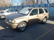 ✅ 2000 Isuzu Rodeo • VIN: 4S2DM58W6Y4335025 • Лот: 41460869. Опубликован ранее на IAAI с пробегом 247 342 миль. Бесплатный доступ к архиву аукционных продаж из США и подробный отчёт об истории автомобиля на DreamBid. Изображение 2.