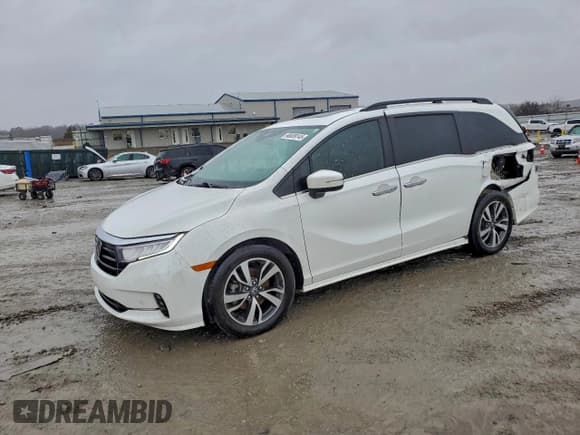 ✅ 2022 Honda Odyssey Touring • VIN: 5FNRL6H82NB051715 • Lot: 90689145. Wystawiony na Copart z przebiegiem 57 423 mil. Bezpłatny archiwum sprzedaży aukcyjnych z USA i szczegółowy raport historii pojazdu na DreamBid. Zdjęcie 1.