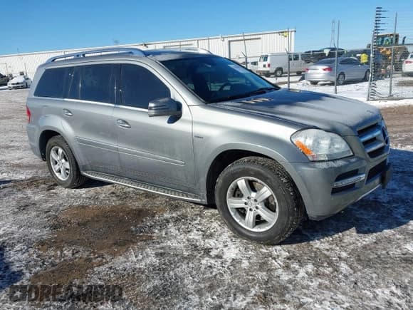 ✅ 2012 Mercedes-Benz GL 350 • VIN: 4JGBF2FE6CA767674 • Lot: 41583802. Listed on IAAI with 101,569 mi. Free auction sales archive from the USA and detailed vehicle history report at DreamBid. Image 1.