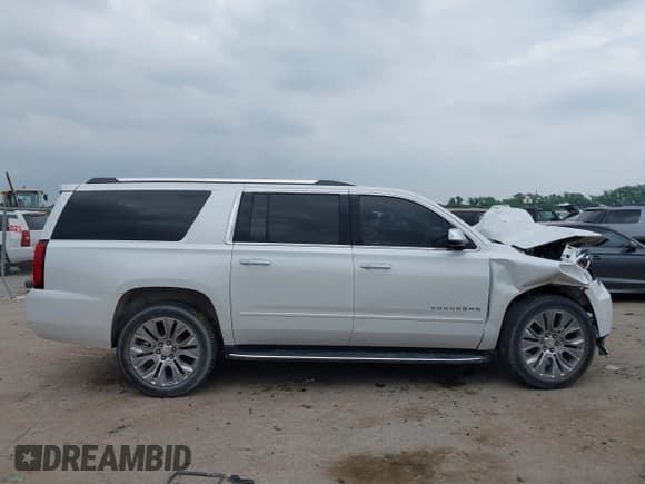 ✅ 2018 Chevrolet Suburban Premier • VIN: 1GNSKJKC2JR378793 • Lot: 42327679. Listed on IAAI with 151,091 mi. Free auction sales archive from the USA and detailed vehicle history report at DreamBid. Image 13.