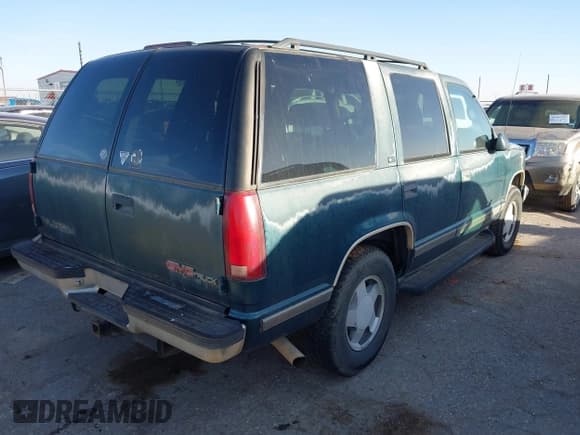 ✅ 1997 GMC Yukon • VIN: 1GKEK13R1VJ723409 • Lot: 41512184. Listed on IAAI with 235,988 mi. Free auction sales archive from the USA and detailed vehicle history report at DreamBid. Image 4.