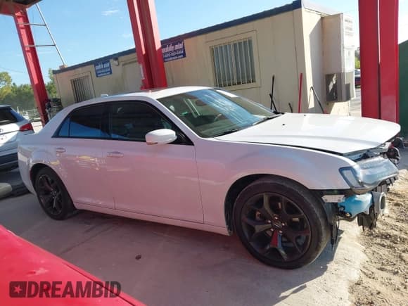 ✅ 2023 Chrysler 300 S • VIN: 2C3CCABG2PH537466 • Lot: 43597480. Listed on IAAI with 51,875 mi. Free auction sales archive from the USA and detailed vehicle history report at DreamBid. Image 14.