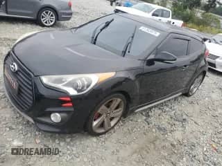 2013 Hyundai Veloster Turbo с VIN KMHTC6AE0DU172251, выставлен на аукционе Copart как лот 81363875 с пробегом 148 591 миль миль и Списание • Salvage title. История ставок и продаж доступна на DreamBid. Изображение 1.