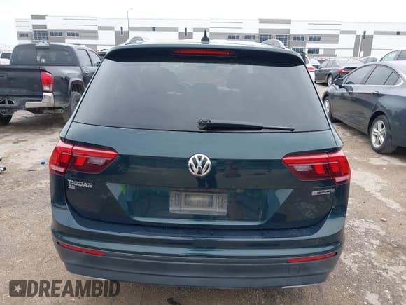 ✅ 2019 Volkswagen Tiguan SE • VIN: 3VV2B7AX8KM196441 • Lot: 43528527. Listed on IAAI with 152,899 mi. Free auction sales archive from the USA and detailed vehicle history report at DreamBid. Image 16.