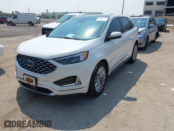 ✅ 2021 Ford Edge Titanium • VIN: 2FMPK4K98MBA18760 • Lot: 43090137. Wystawiony na IAAI z przebiegiem 66 752 mil. Bezpłatny archiwum sprzedaży aukcyjnych z USA i szczegółowy raport historii pojazdu na DreamBid. Zdjęcie 2.