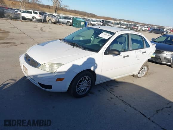✅ 2007 Ford Focus S • VIN: 1FAFP34N77W263497 • Lot: 43660448. Listed on IAAI with 121,965 mi. Free auction sales archive from the USA and detailed vehicle history report at DreamBid. Image 18.
