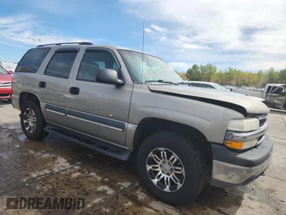 ✅ 2003 Chevrolet Tahoe LS • VIN: 1GNEK13V13J260457 • Lot: 80147635. Listed on Copart with 241,493 mi. Free auction sales archive from the USA and detailed vehicle history report at DreamBid. Image 4.