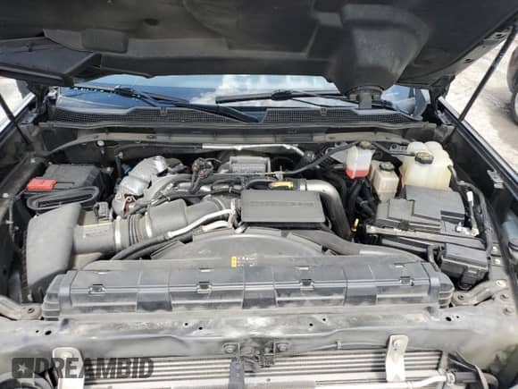 2022 Chevrolet Silverado 2500HD High Country z VIN 1GC4YREY7NF149717, wystawiony jako Copart lot #60214585 z przebiegiem 111 930 mil mil oraz Szkoda całkowita • Salvage title. Historia ofert i sprzedaży dostępna na DreamBid. Obrazek 11.