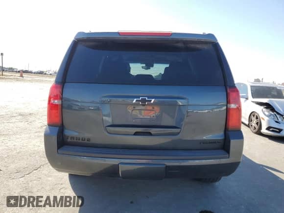 2019 Chevrolet Tahoe Premier z VIN 1GNSKCKJ9KR200083, wystawiony jako Copart lot #57910955 z przebiegiem 53 126 mil mil oraz Szkoda całkowita • Salvage title. Historia ofert i sprzedaży dostępna na DreamBid. Obrazek 6.