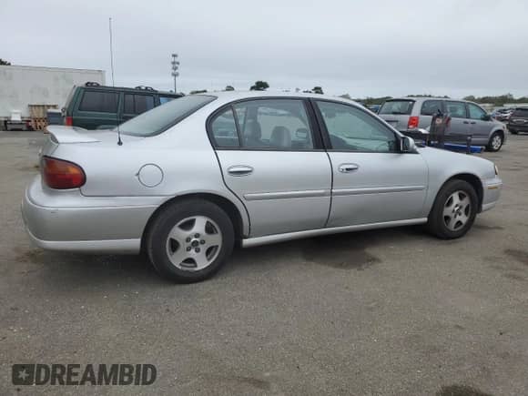 2003 Chevrolet Malibu LS z VIN 1G1NE52J63M692040, wystawiony jako Copart lot #72991244 z przebiegiem 155 367 mil mil oraz Czysty tytuł • Clean title. Historia ofert i sprzedaży dostępna na DreamBid. Obrazek 3.