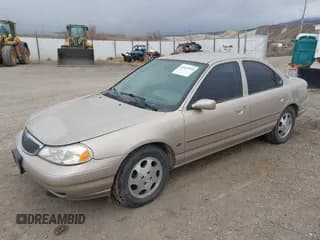 ✅ 1999 Mercury Mystique GS • VIN: 1MEFM6538XK606647 • Лот: 41613999. Опубликован ранее на IAAI с пробегом 90 978 миль. Бесплатный доступ к архиву аукционных продаж из США и подробный отчёт об истории автомобиля на DreamBid. Изображение 2.